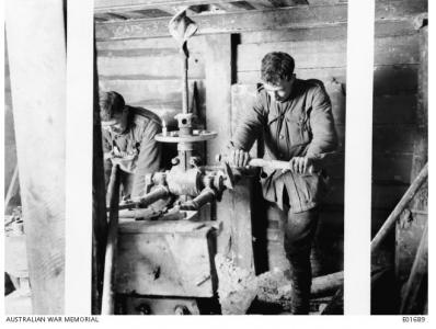 3rd Australian Tunnelling Coy. drilling a ventillation hole in a tunnel 1917. Photographer unknown, photograph sourced AWM E01689