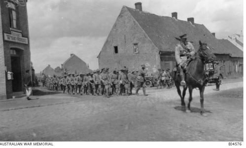 3rd Division Field Ambulance marching past Maj.Gen Birdwood. Photographer unknown, photograph source AWM  E04576