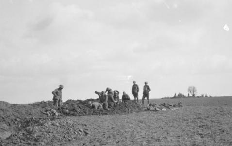 3rd Division Infantry digging trenches at Mericourt  March 1918. Photographer unknown, photograph source AWM E01849