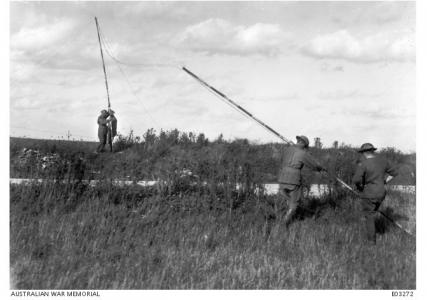 4th Division Signal Engineers laying Communication Lines prior to the battle of. Photographer unknown, photograph source AWM E03272