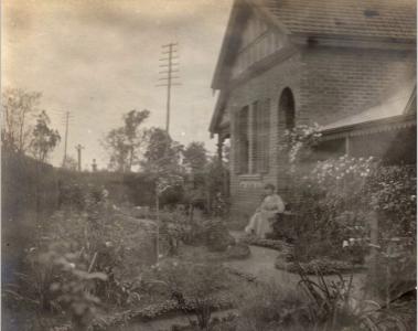 Elsie Hillman in the garden of 70 East Street, Guildford. Photograph from the Helene B. Huelin Collection, source Hillman family