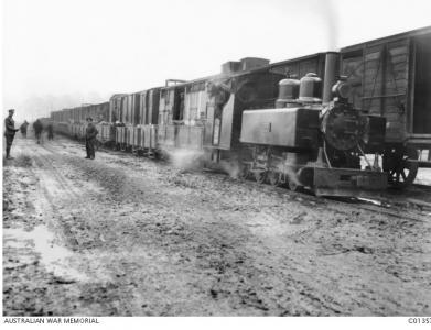 Ammunition transfer from Broad Gauge to Light Gauge Rail, Frizeville, Belgium 1917. Photographer unknown, photograph source AWM C01357 