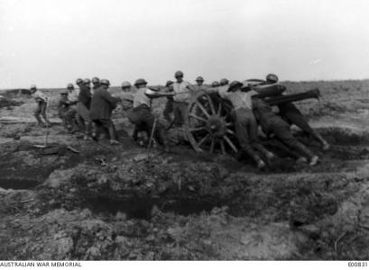 Australian Artillery hauling guns over muddy terrain Sept. 1917 near Ypres. Photographer unknown, photograph source AWM E00831