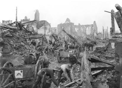 Australian troops collecting bricks for roadworks on the Dickibusch Road, Belgium. Photographer unknown, photograph source AWM E01403