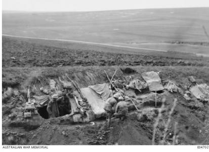 Dugout in  a collapsed  section of road, Morlancourt 1918. Photographer unknown, photograph source AWM E04702