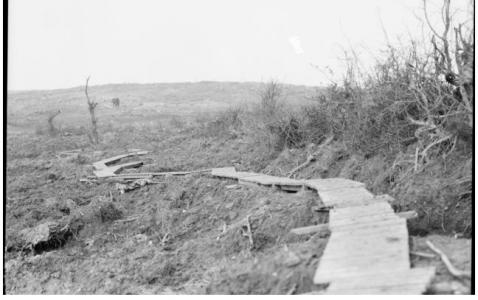 Duckboard track at Broodsende Ridge 1917. Photographer unknown, photograph sourced from  AWM E01148