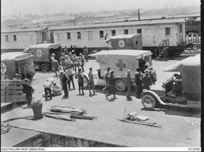 Gallipoli wounded being loaded onto a hospital train for Cairo 1915. Photographer unknown, photograph source AWM H12939