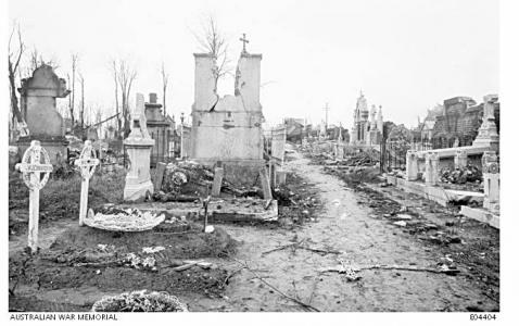 Grave of W.J. Conaughton in foreground at Villers-Bretonneux 1919. Photographer unknown, image sourced AWM E04404