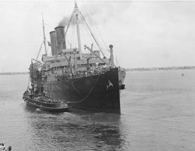 HMAT &#039;Orsova&#039; A67 pushed by tug. Photographer Josiah Barnes, photograph source AWM PB0776