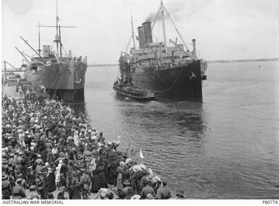 HMAT 'Orsova' is pushed from the wharf by tugboat 'Racer', Melbourne 1916. Photographer unknown, photograph source AWM B0776 