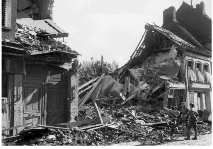 Hazebrouck- shell damaged store. Photographer unknown, photograph source AWM E2285