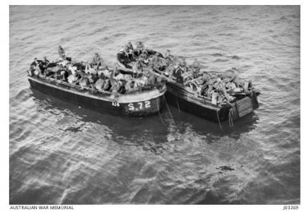 Horses and Guns going ashore at Gallipoli 1915. Photograph source Darge Studio, image sourced from the AWM J03269