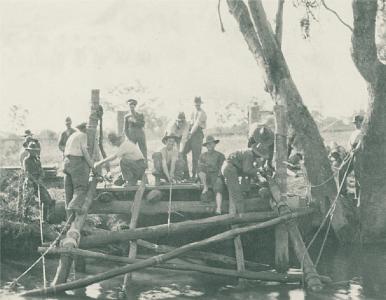  Lieut J.J.H. Napier training 13th Field Engineers in bridge building. Helena River Guildford  c1915. Photo source V Napier