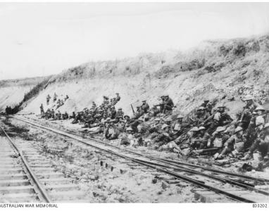Infantry resting enroute to the front line at St Quentin September 1918.  Photographer unknown, photograph source AWM E03202