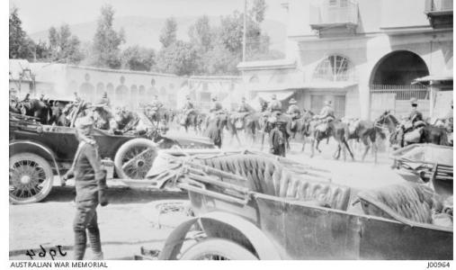 Light Horsemen of the Australian Mounted Division riding through Damascus 1918. Photographer unknown, photograph source AWM J00964
