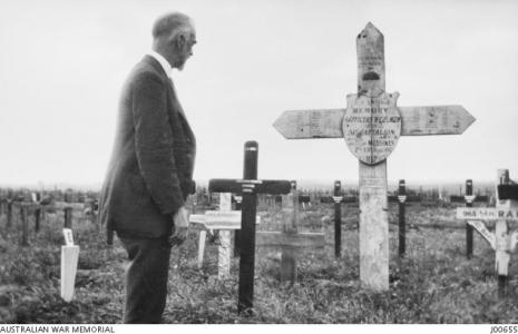 Messines Ridge Cemetery, showing a grave for Officers and NCOs amongst other graves. Donor A.T.Sharp Collection, photograph source AWM J00655