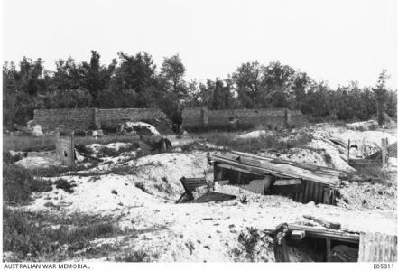 Mont St Quentin Village shell damaged trenches and town wall 1918. Photographer unknown, photograph source AWM E05311