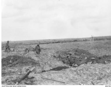 Polygon Wood, Australian soldiers on shell holes. Photographer unknown, photograph source AWM E00783