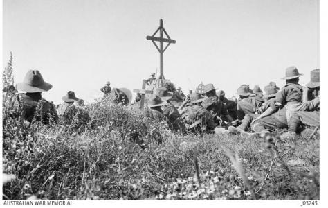 Unveiling the Memorial to those who fell from the 24th Bn. Pozieres- Mouquet Farm July 1917. Photographer unknown, donor Mr.E. Basling, photograph source AWM J03245