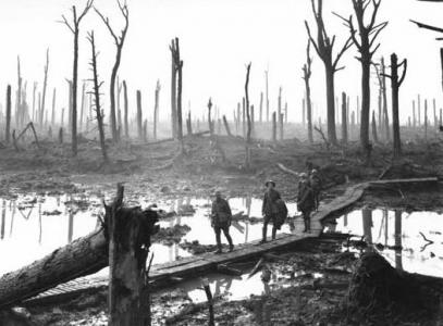 Ypres. Australian Artillery on duckboards at Chateau Wood 1918. Photographer F.J. Hurley,  photograph AWM E08184